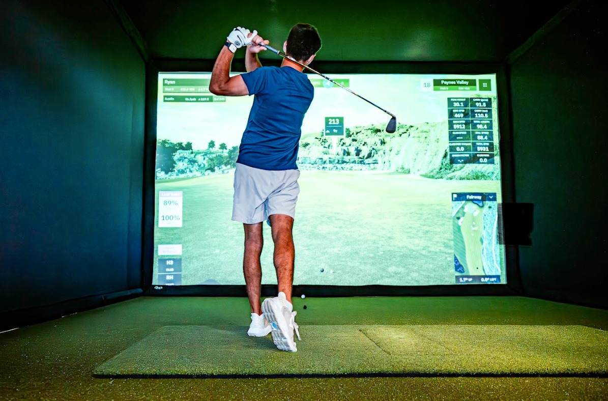 Golfer working on putting tempo indoors